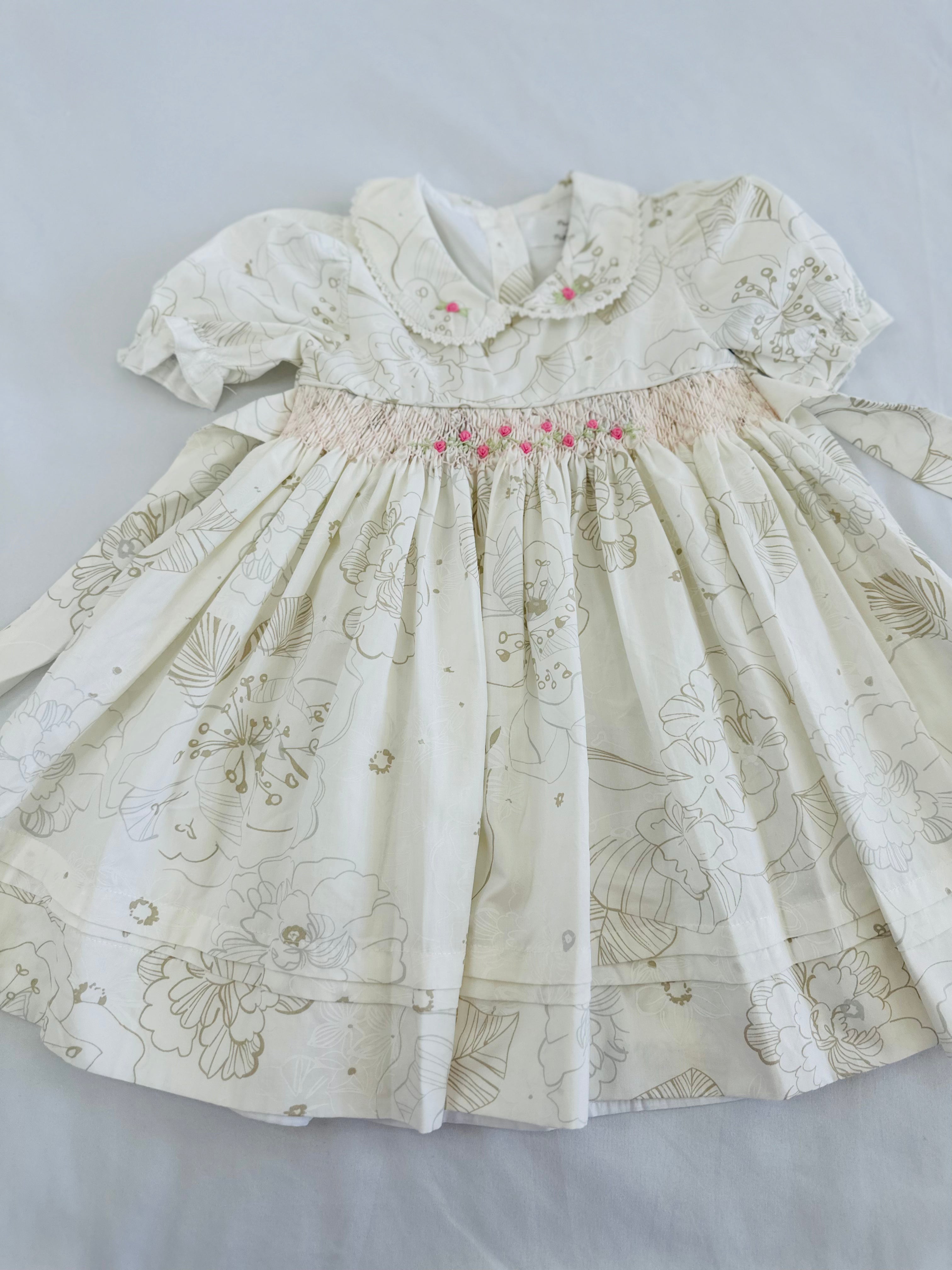 Adorable hand smocked floral dress Pastels and Polkadots