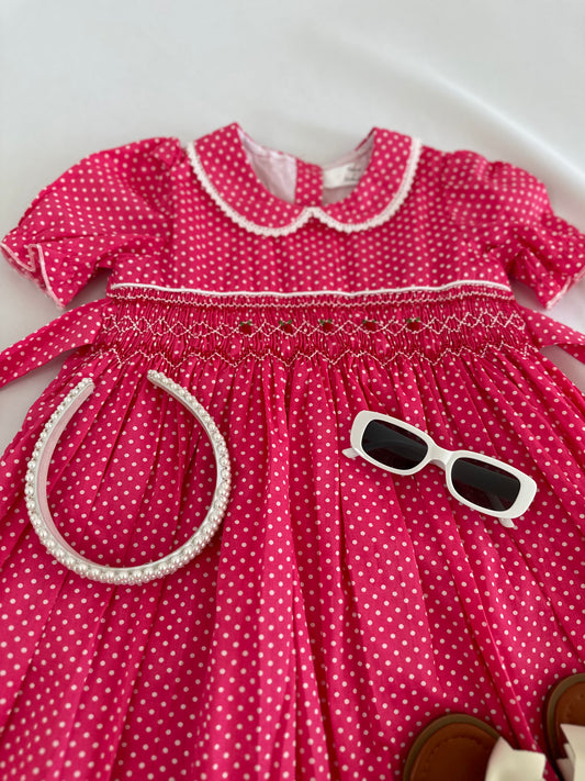 Adorable smocked polkadots dress with hand embroidered flower details