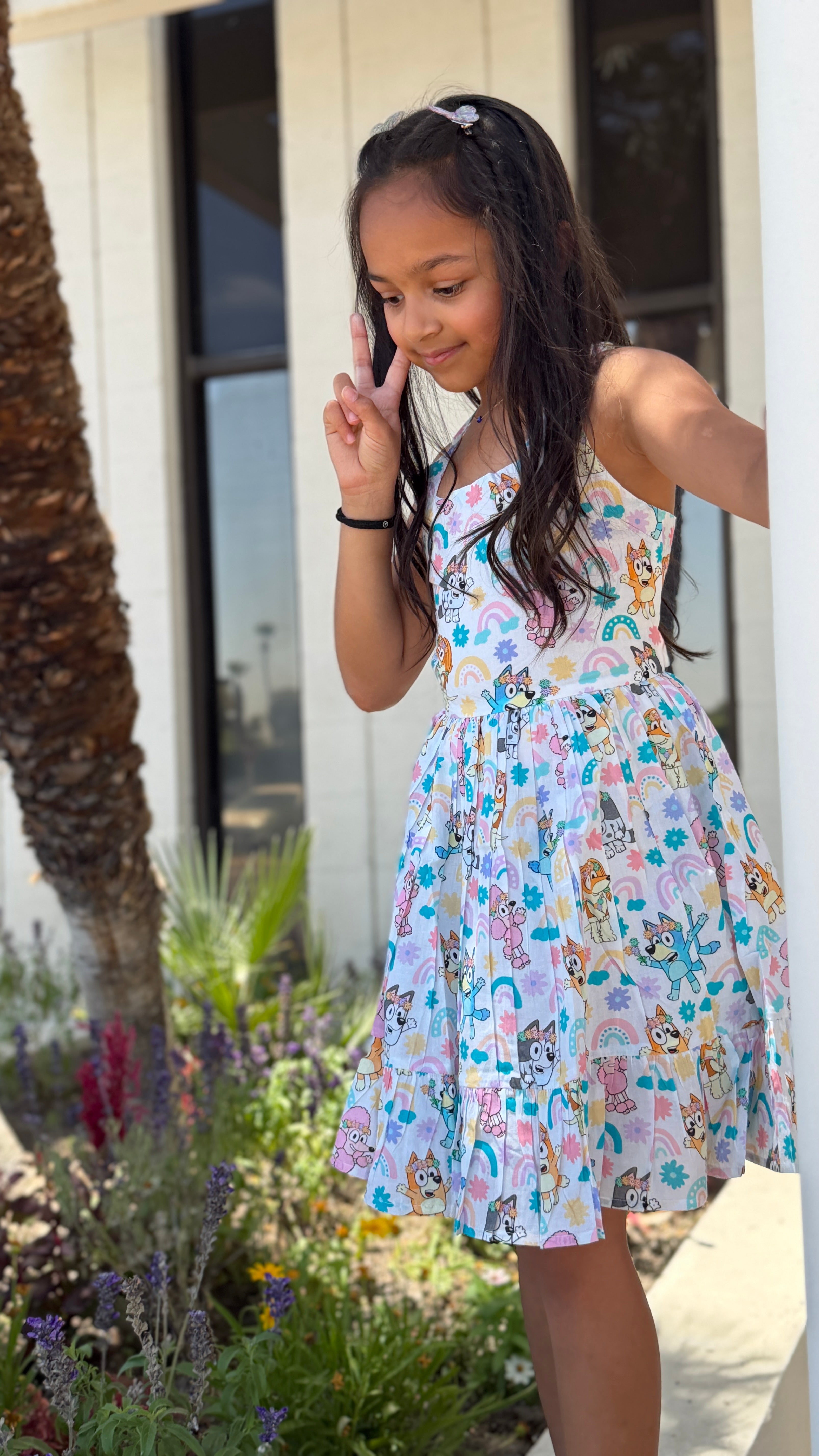 Girls Twirl Dress — White Cartoon Character Print with Ruffle Hem